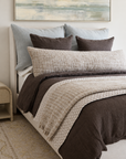 Avalon Matelasse quilted bedding set with beige cover and dark brown pillows