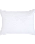 Rectangular matelasse pillow sham with small geometric pattern in white