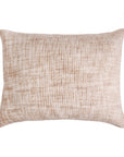 Rectangular decorative pillow with pale apricot textured weave and stitched edges
