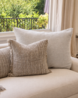 Decorative throw pillow with insert, beige textured weave and subtle fringe