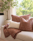 Decorative throw pillows with insert, rust-orange textured fabric and fringe