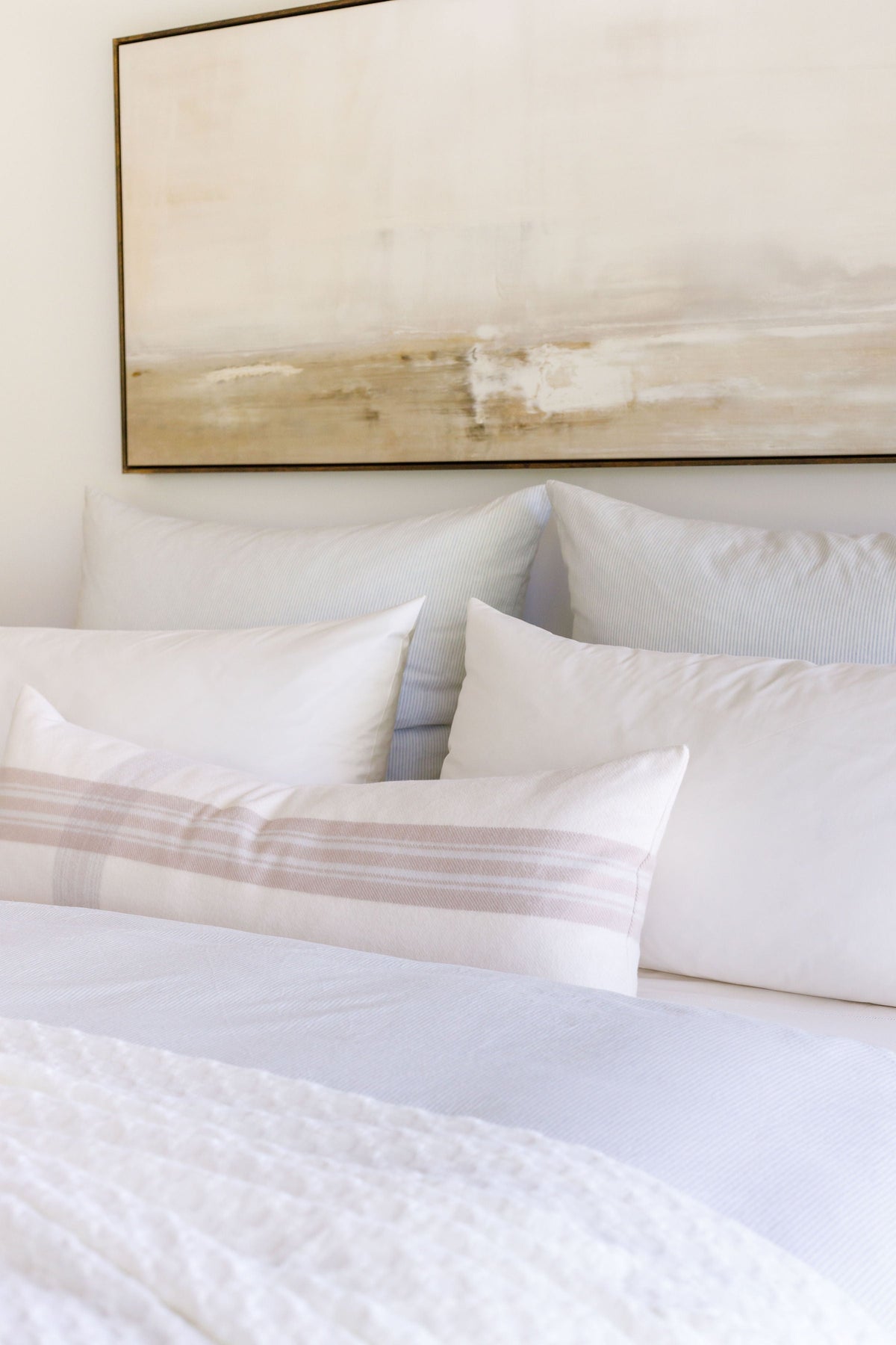 White cotton sateen sheet set with multiple pillowcases and envelope closures