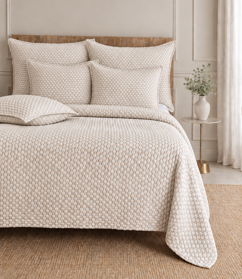 Quilted oatmeal bedding set with textured duvet cover and matching square shams