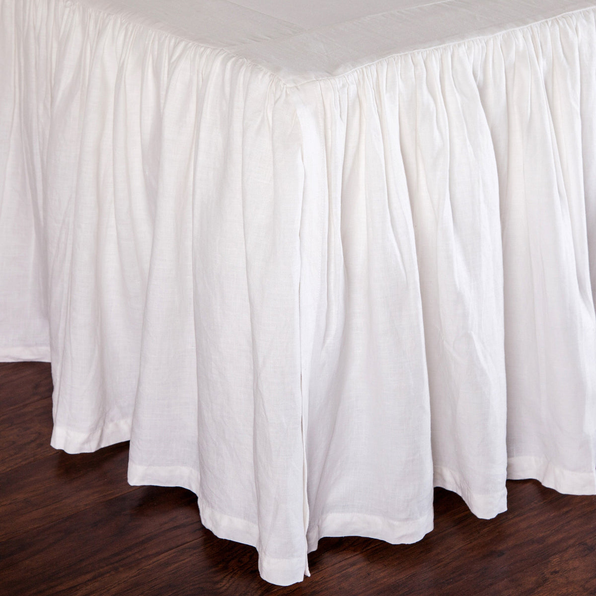 White gathered linen bedskirt skirt with pleated drape and gathered top