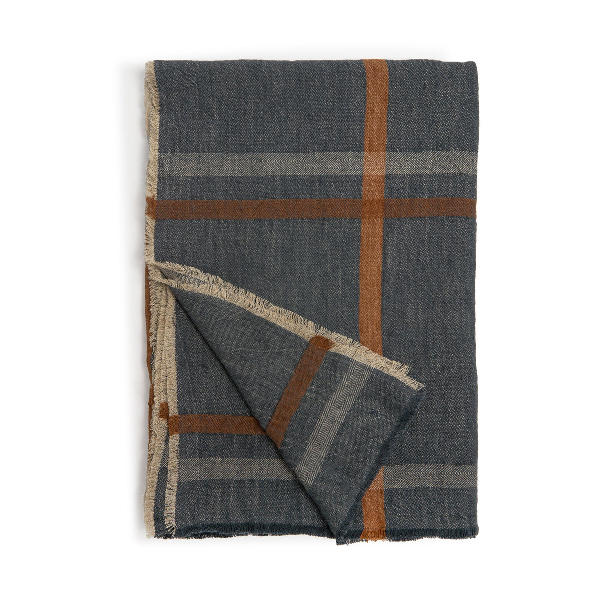 Oversized throw blanket in dark gray with tan plaid grid and fringed edges.