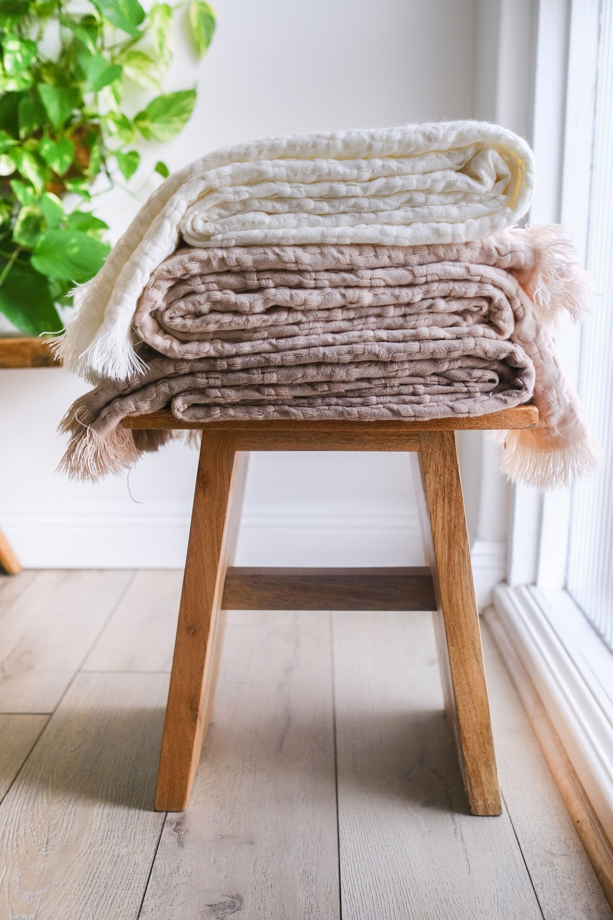 Delphine oversized throw in neutral taupe and light beige with woven texture and fringe