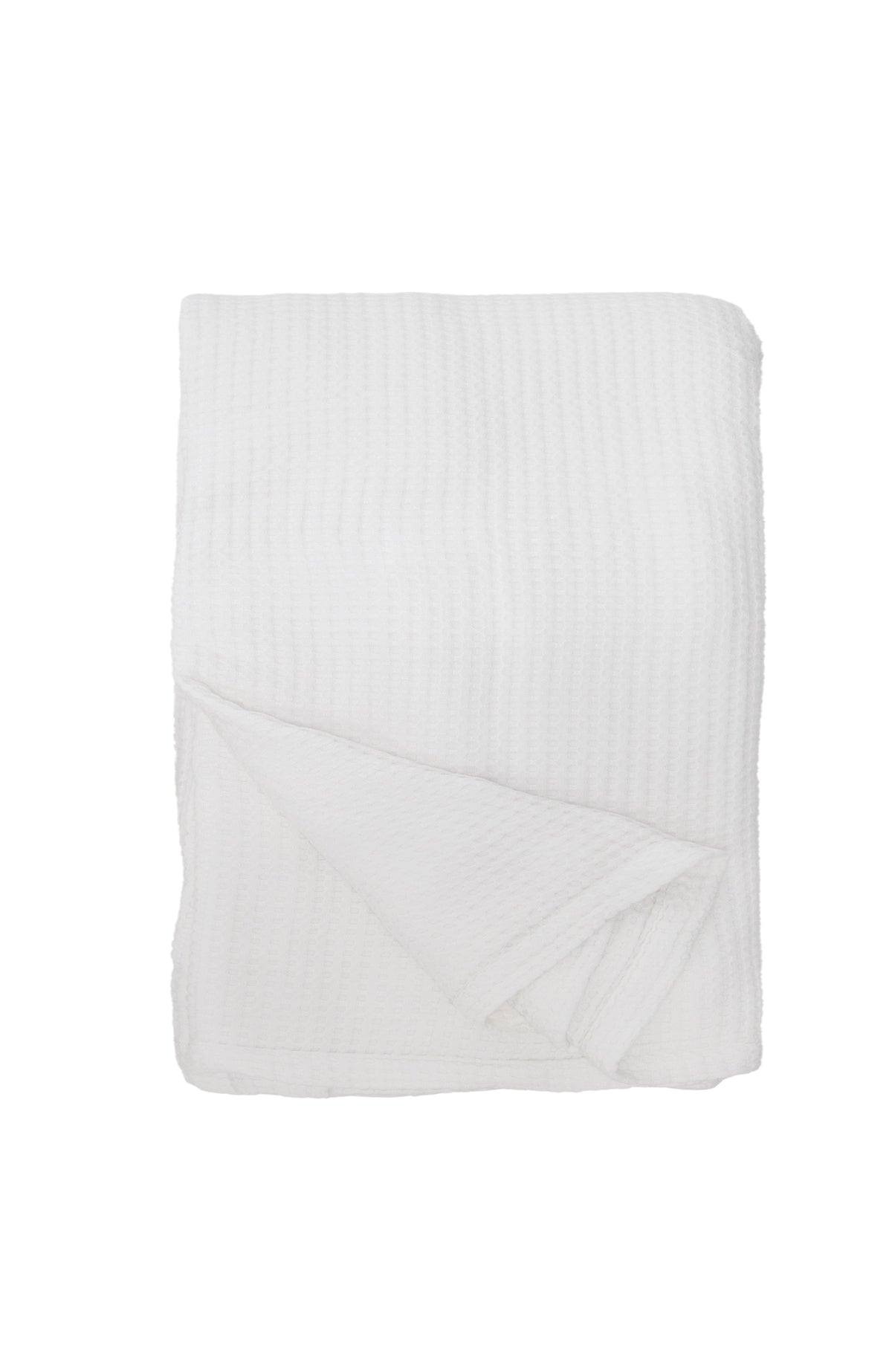 White waffle-knit oversized throw blanket, folded with diagonal drape on a white background.