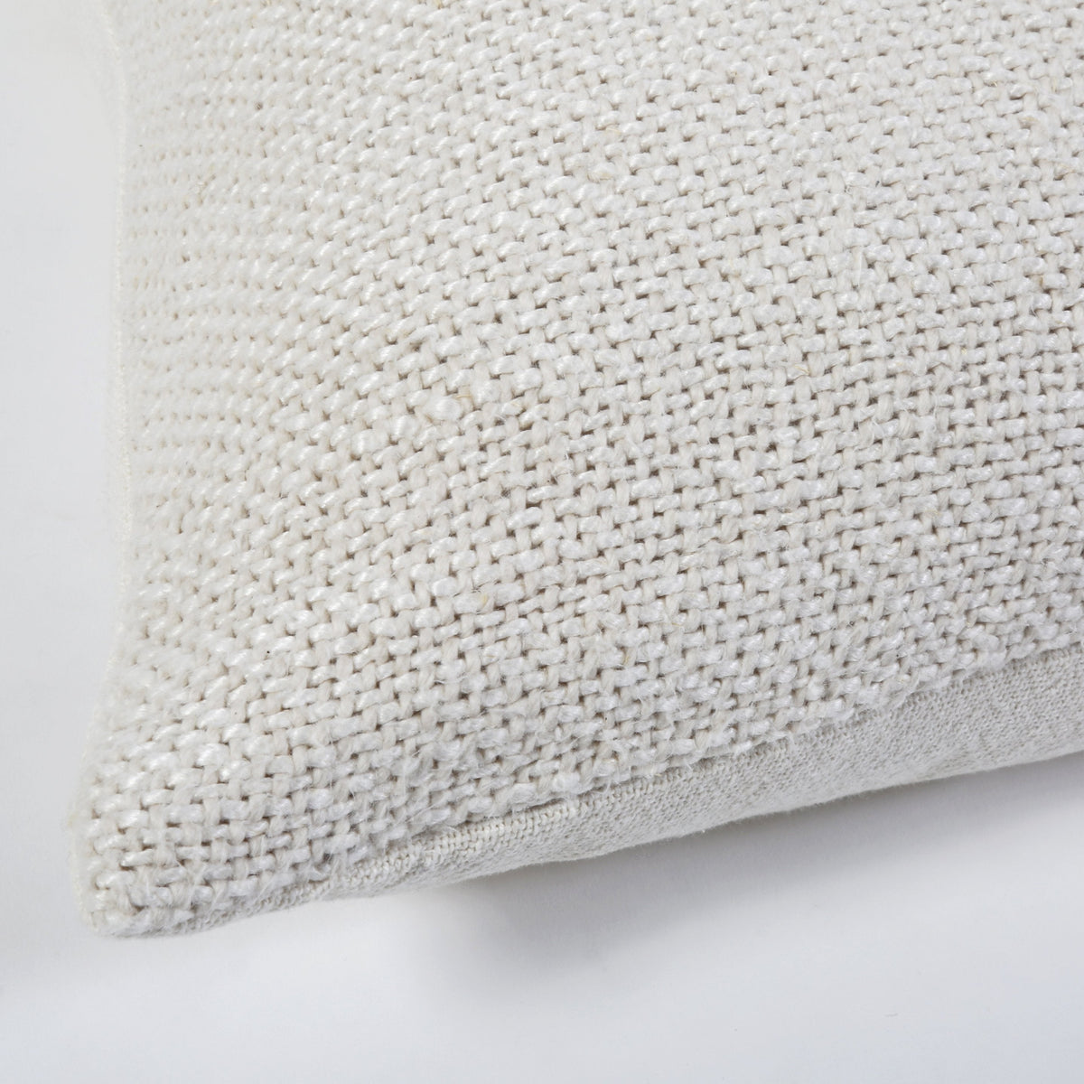 14x40 cream woven pillow fabric close-up with stitched edge