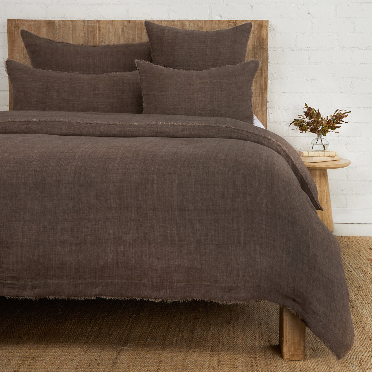 Walnut brown duvet cover with matching pillow shams, textured weave and frayed edges