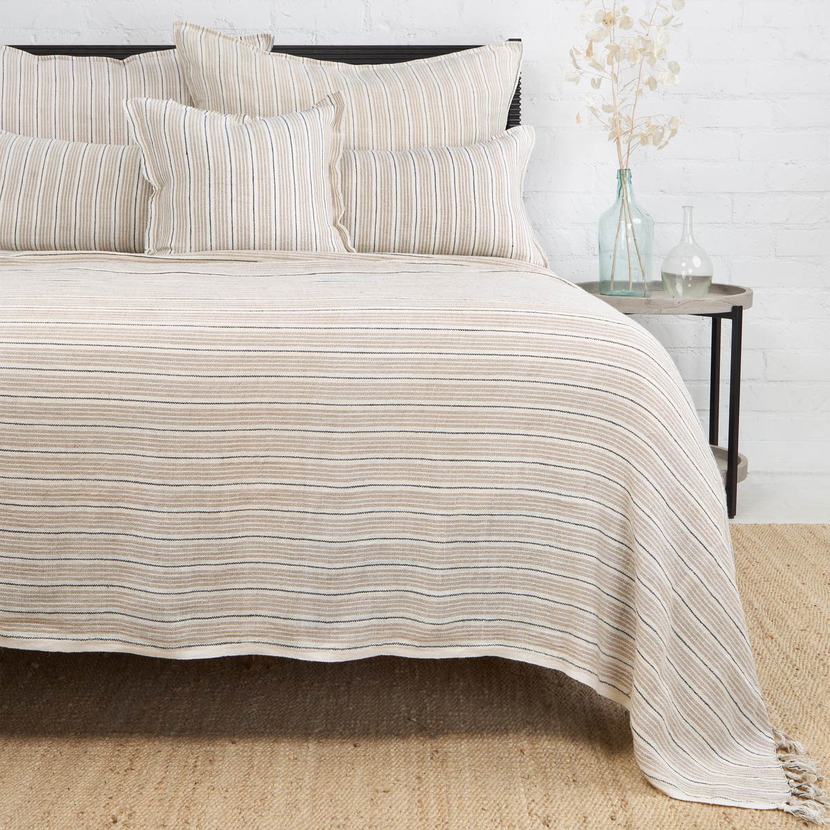 Striped woven blanket with tassel fringe edges, beige and dark gray vertical lines