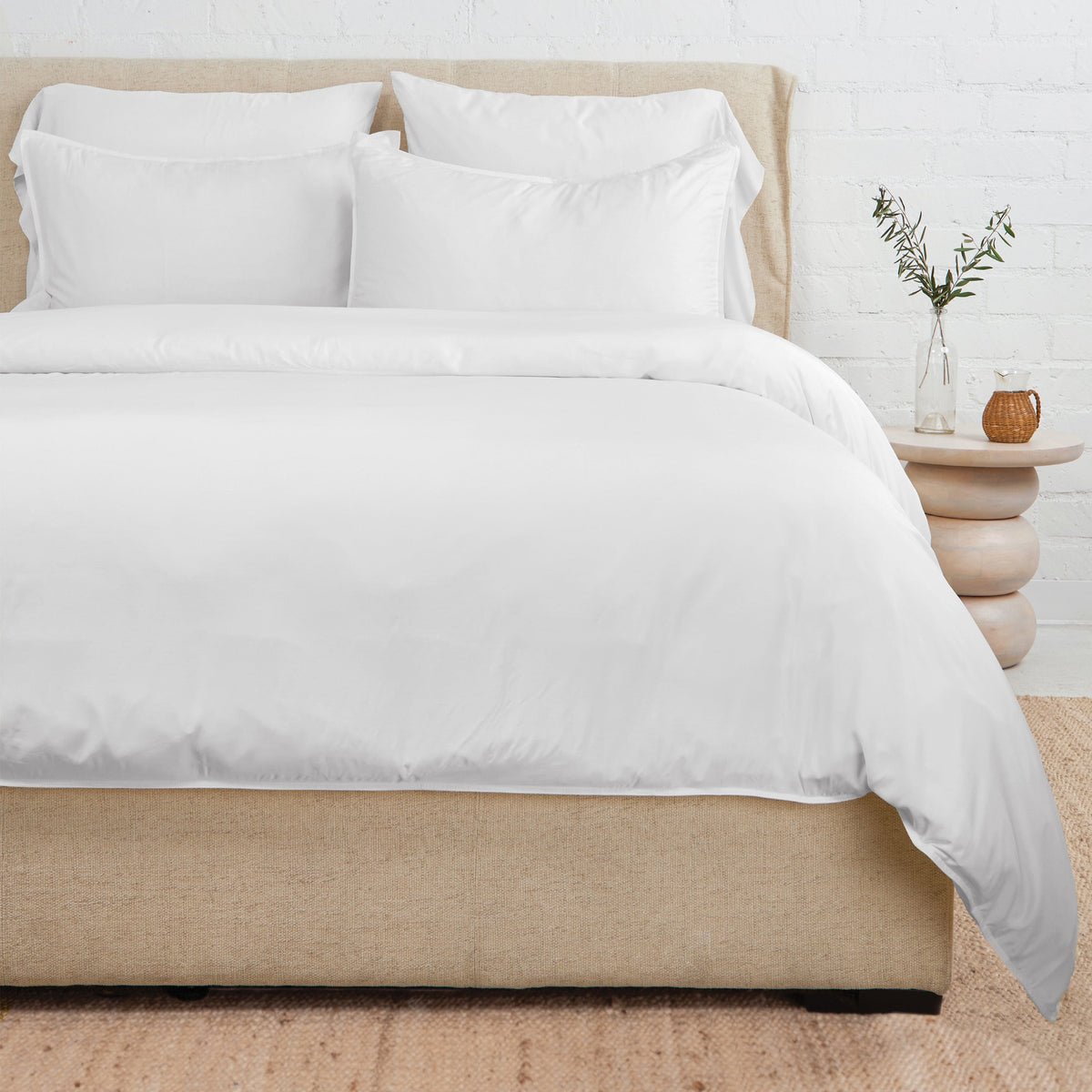 Ivory bamboo sateen duvet set with two pillow shams and tucked corner