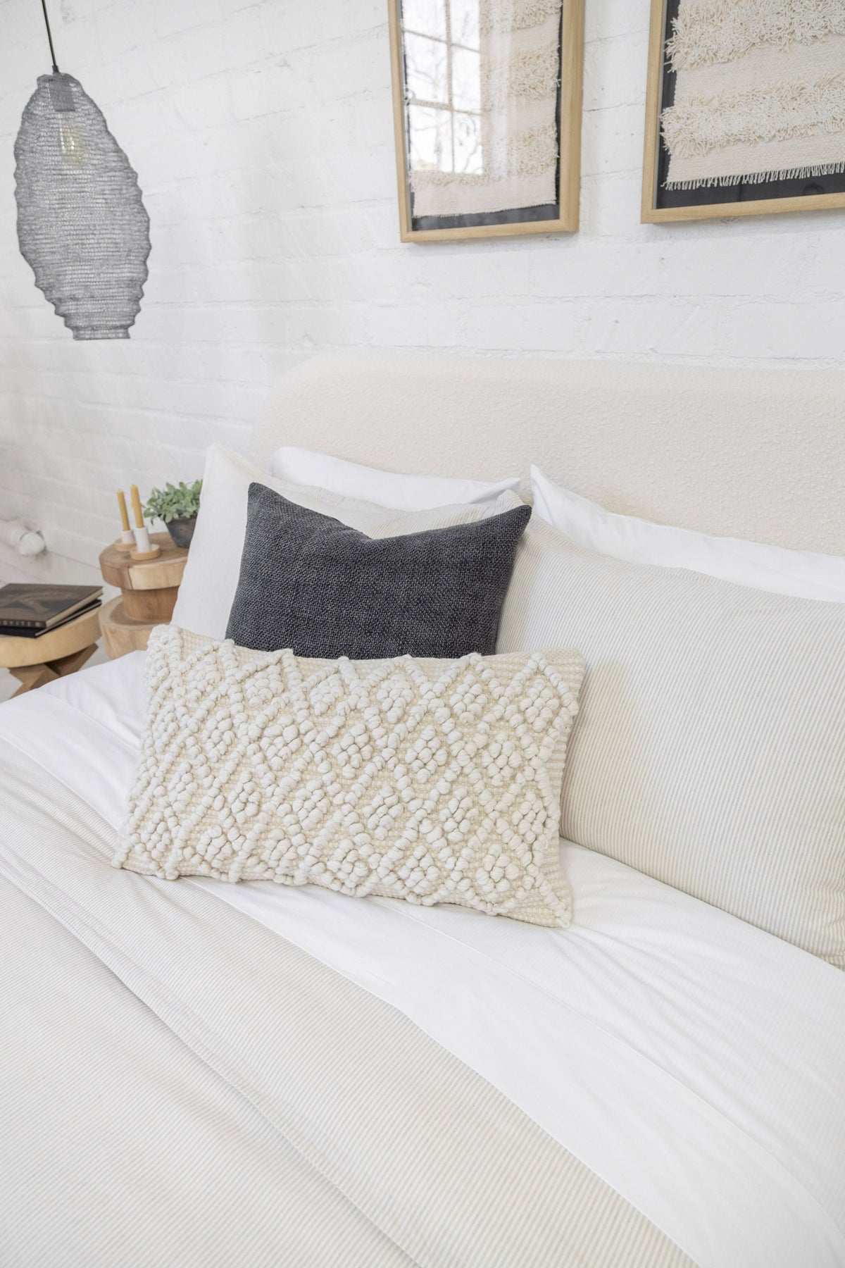 Natural striped duvet cover with textured sham and visible pillow edges