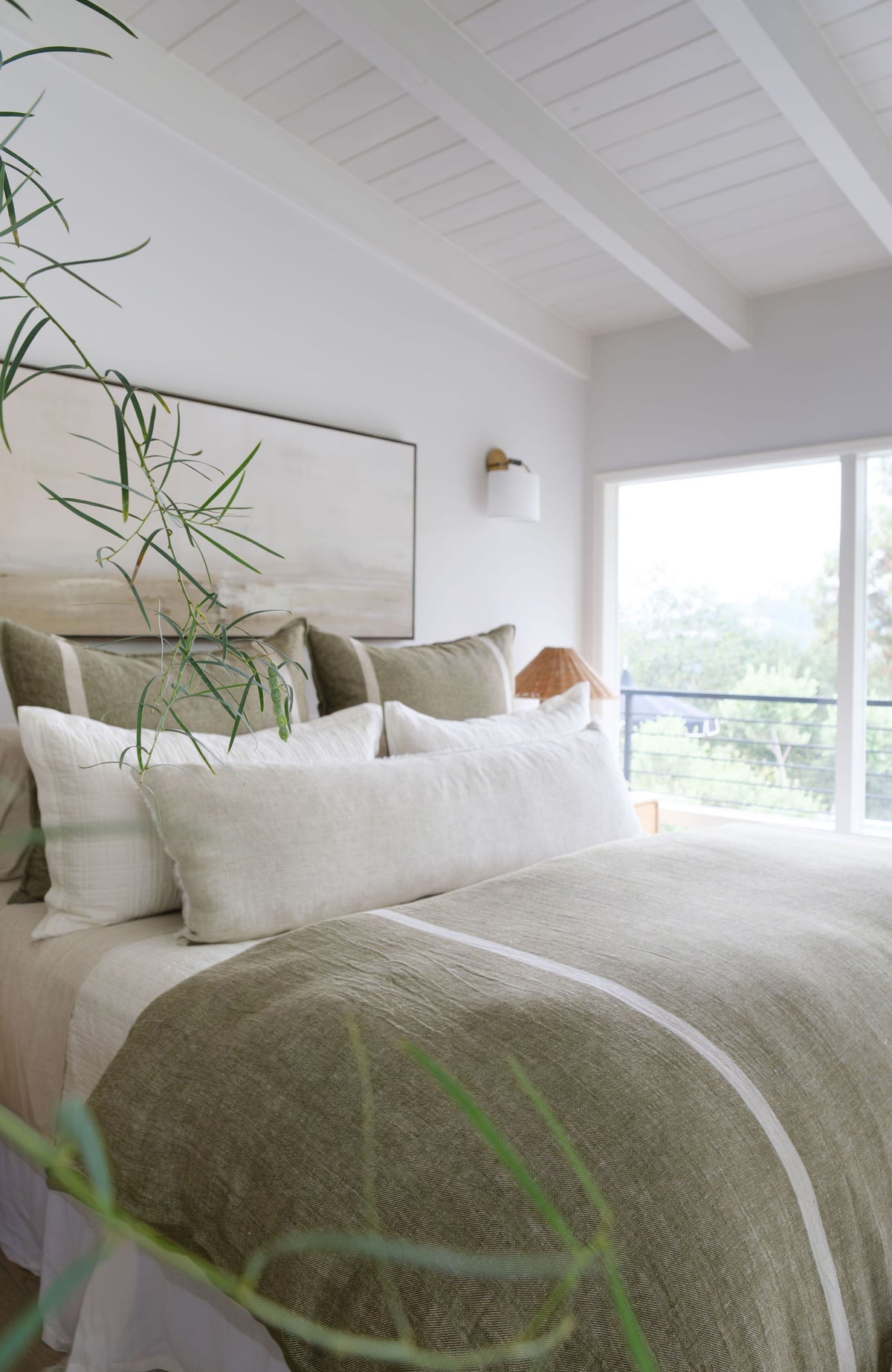 White duvet cover with wide sage-green stripe running lengthwise