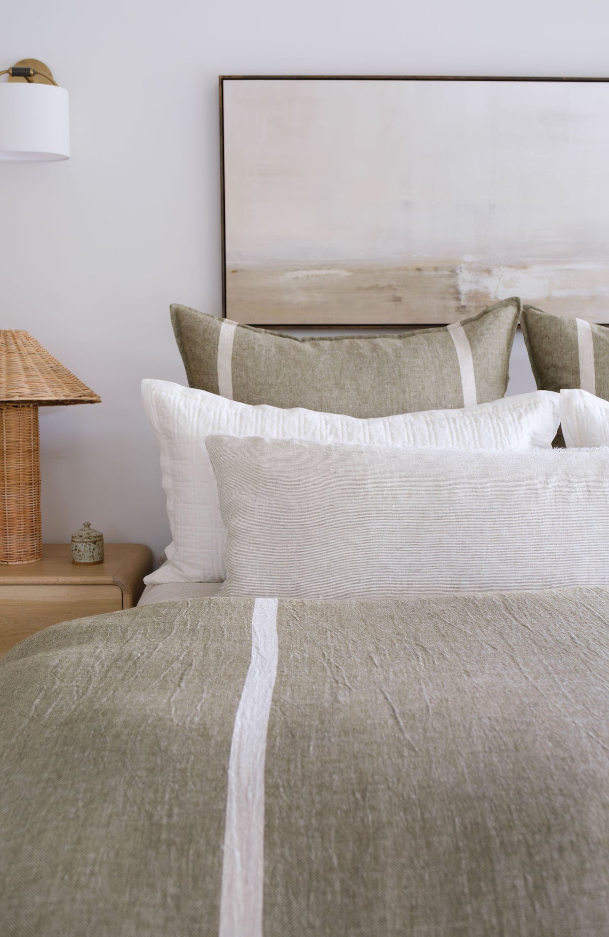 White and olive-toned duvet cover with textured vertical stripe detail