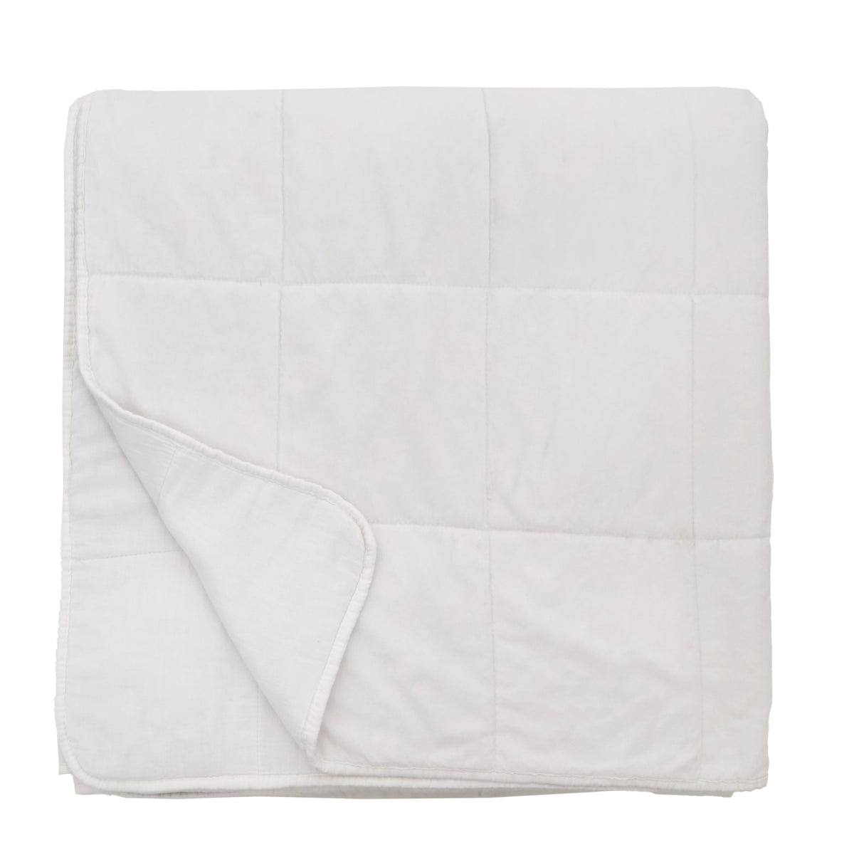 Oversized throw blanket in white, folded with stitched quilted grid and rounded edge