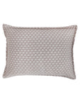 Rectangular matelasse pillow sham with small geometric pattern in blush