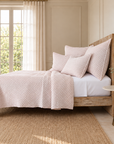 Matelasse quilted bedding set in blush pink with matching pillows and coverlet