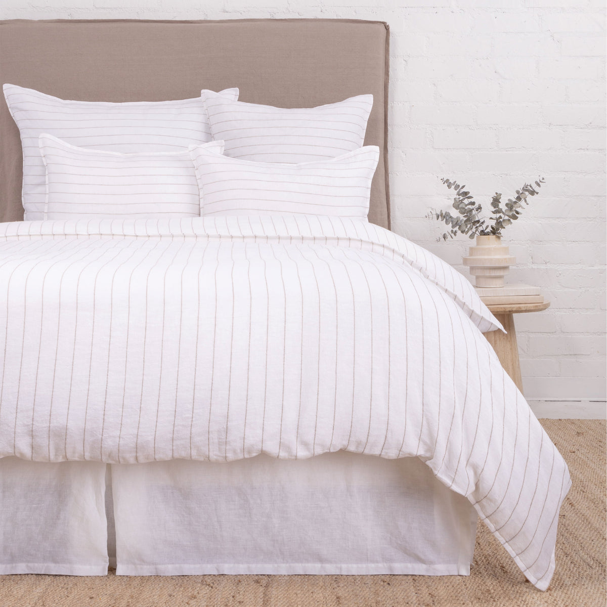 Striped white duvet cover set with thin gray lines and coordinating pillow shams