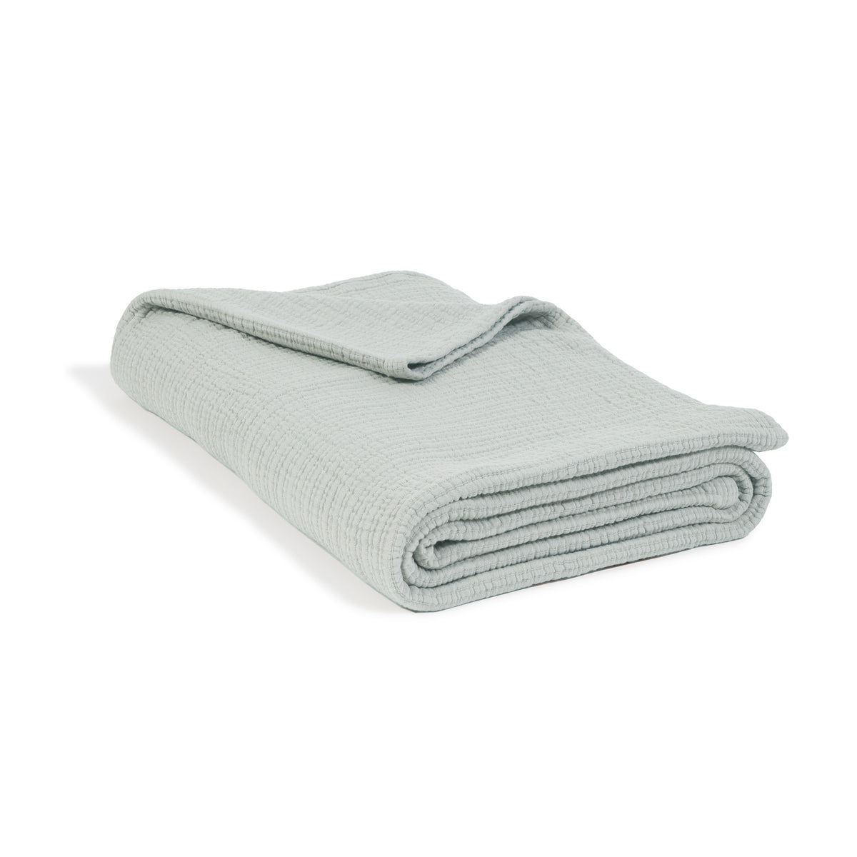 Chatham oversized throw in sea glass, folded with rolled edge