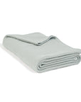 Chatham oversized throw in sea glass, folded with rolled edge