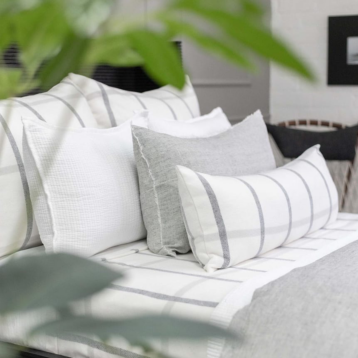 14x40 plaid throw pillow with white cover and grey stripe accents, includes insert