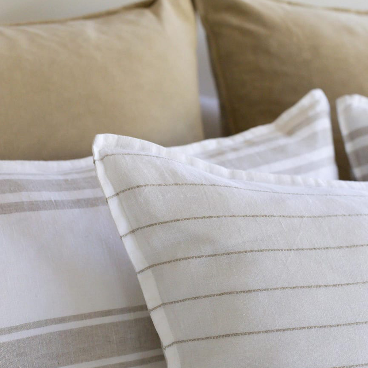 White duvet cover with thin tan stripe bands and textured fabric