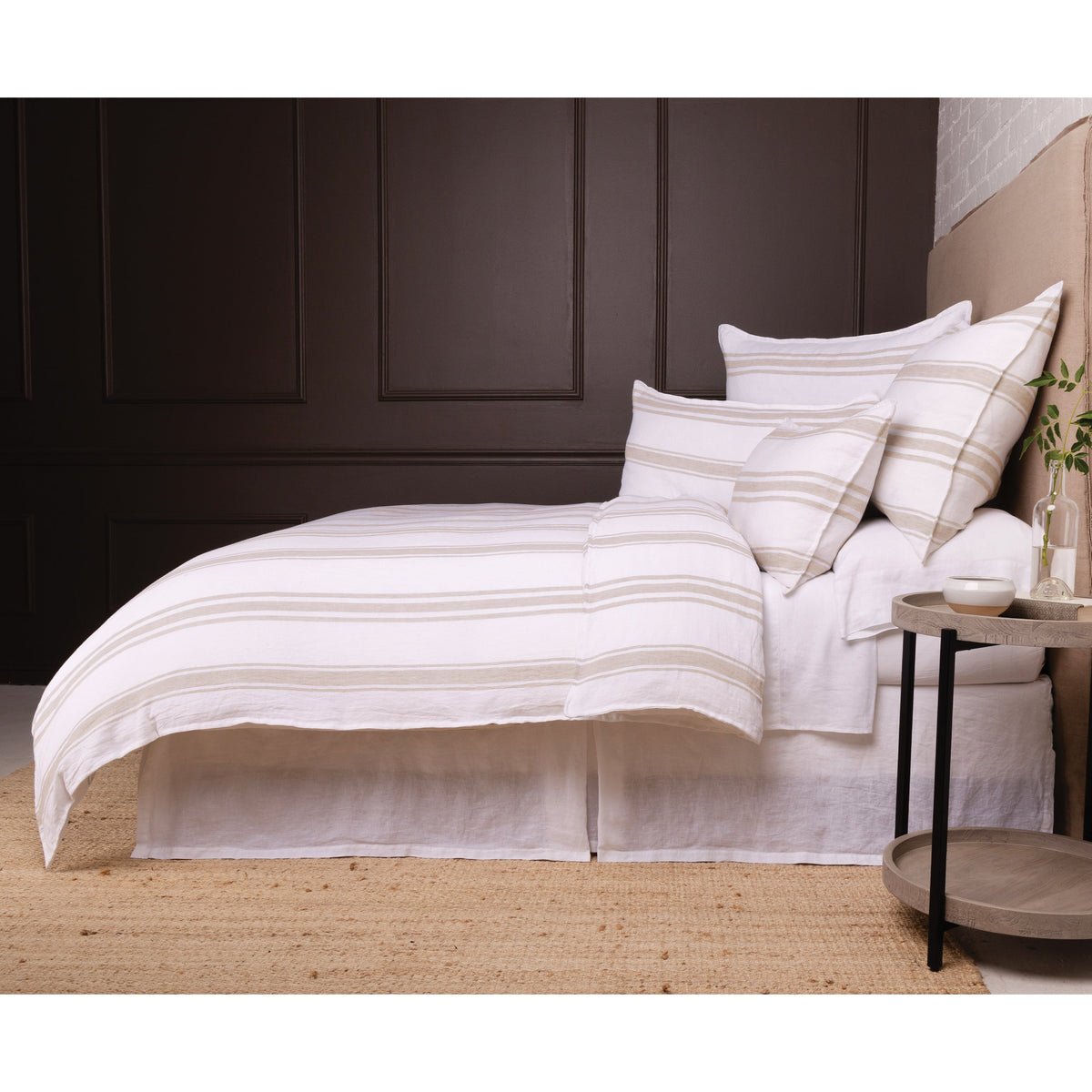 White duvet cover set with thin horizontal gray stripes and matching shams