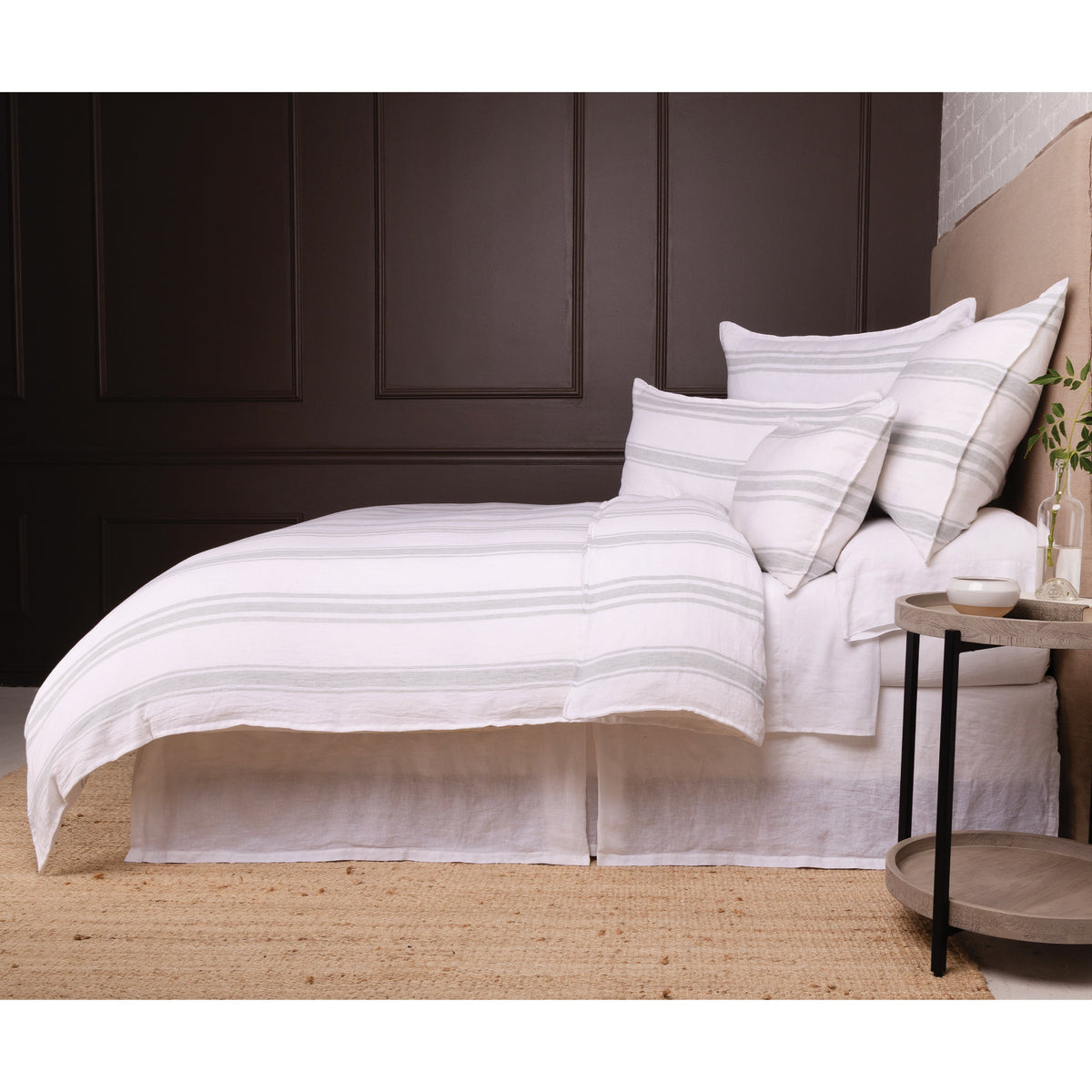White duvet cover set with horizontal stripe pattern and matching pillow shams