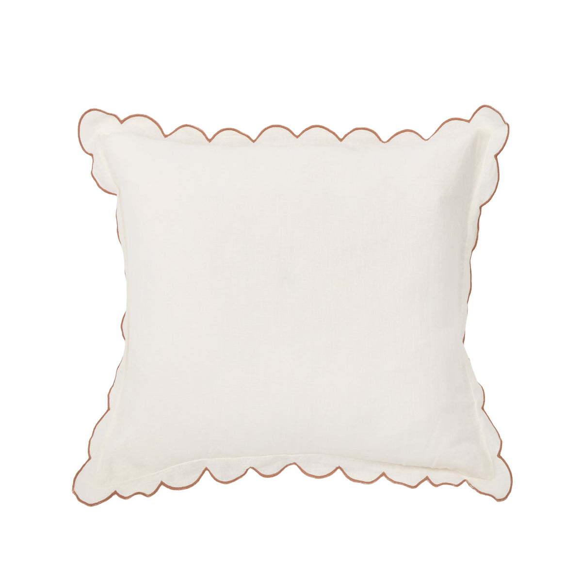 White pillow sham with scalloped border and tan piping