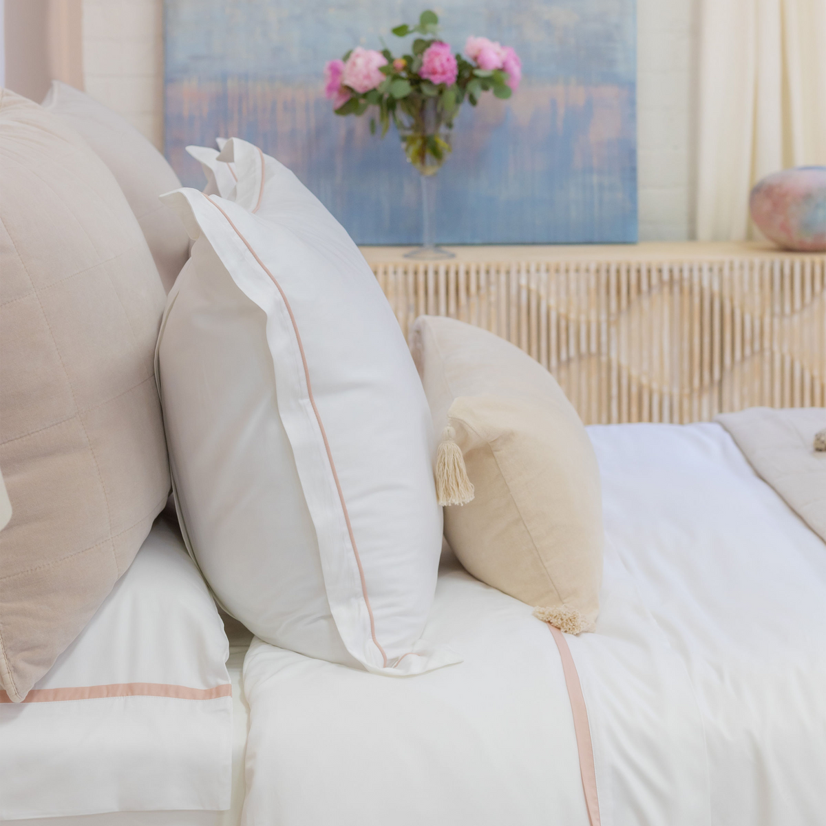 Bamboo sateen duvet cover set with white and beige shams featuring tassel and ribbon trim