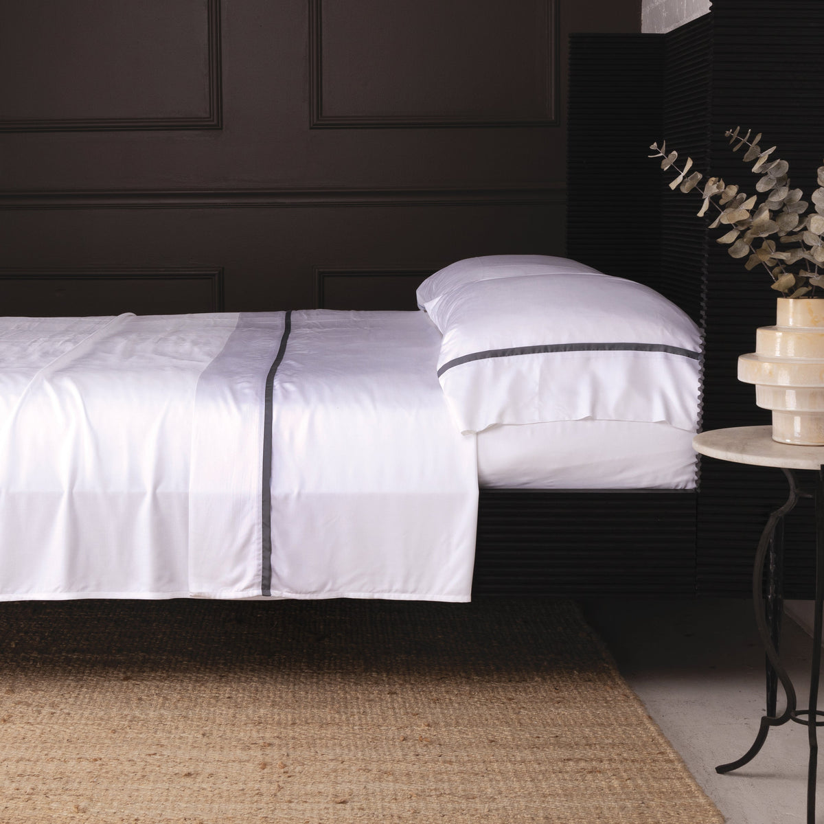 White bamboo sateen sheet set with dark trim border and matching pillowcase