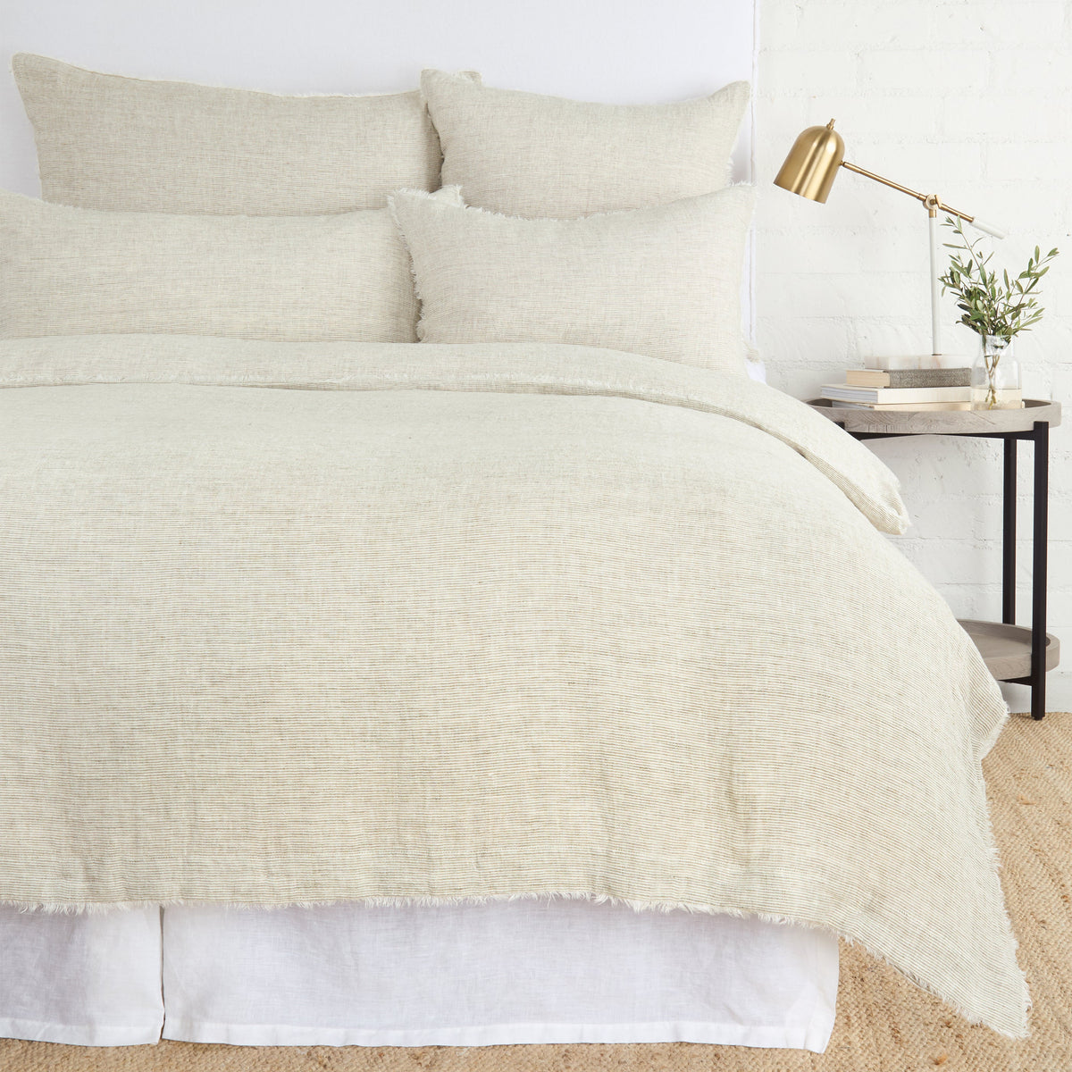Logan duvet cover in light beige, textured fabric with soft fringe trim