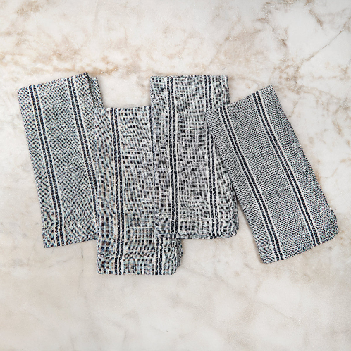 Striped linen napkin set in light grey with dark blue vertical bands