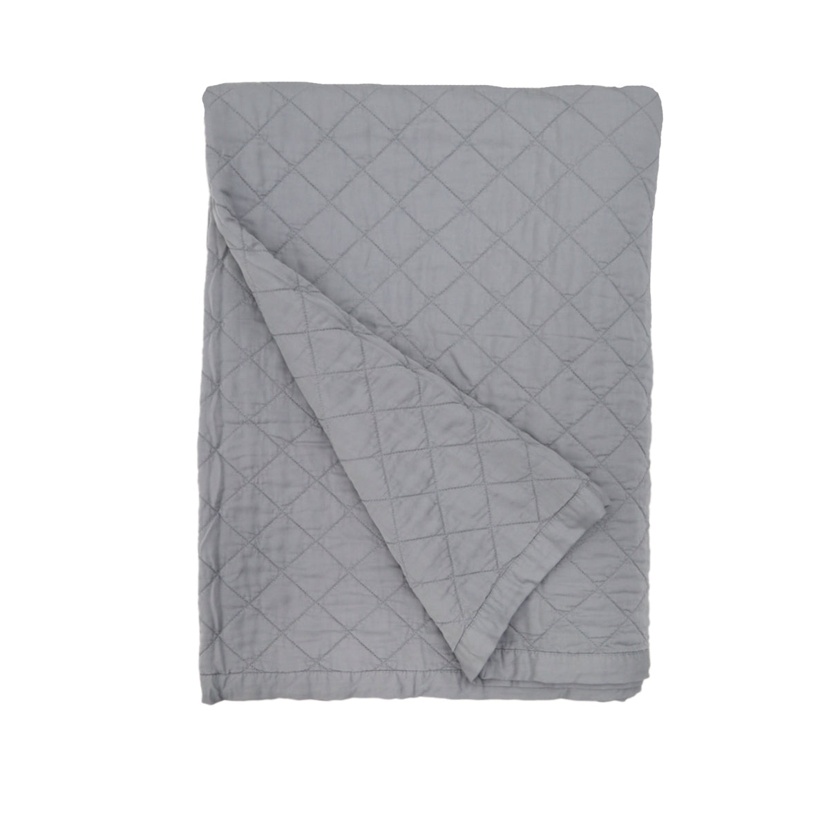Monaco oversized throw blanket in gray with diamond-quilt pattern, neatly folded