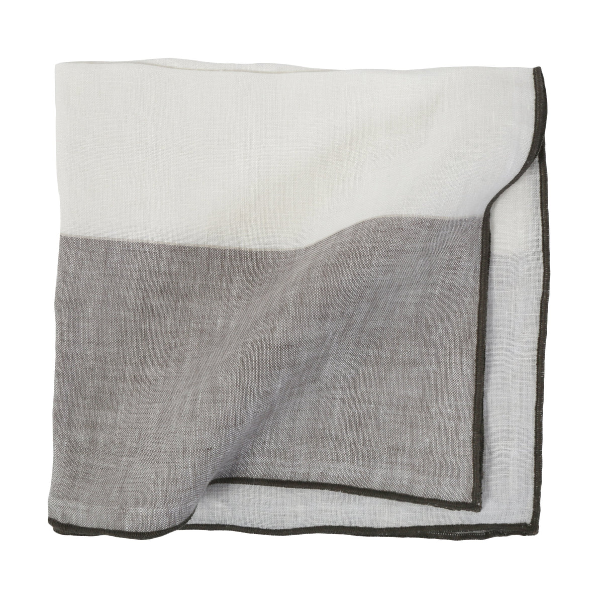 Two-tone napkin in white and gray with dark stitched edge and folded corner