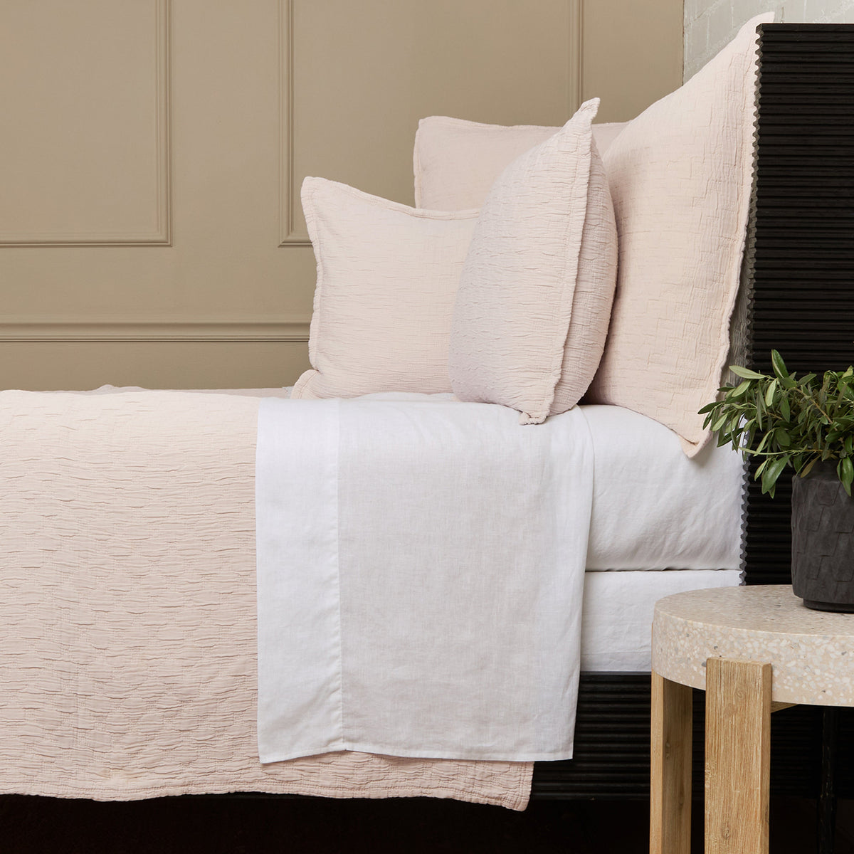 Ojai Matelasse quilt with matching shams and pillows, white matelasse texture