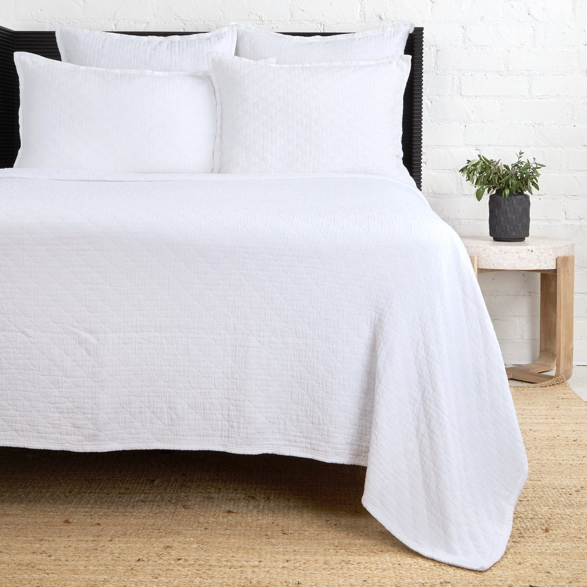 Ojai Matelasse quilt with matching envelope shams, crisp white matelasse weave