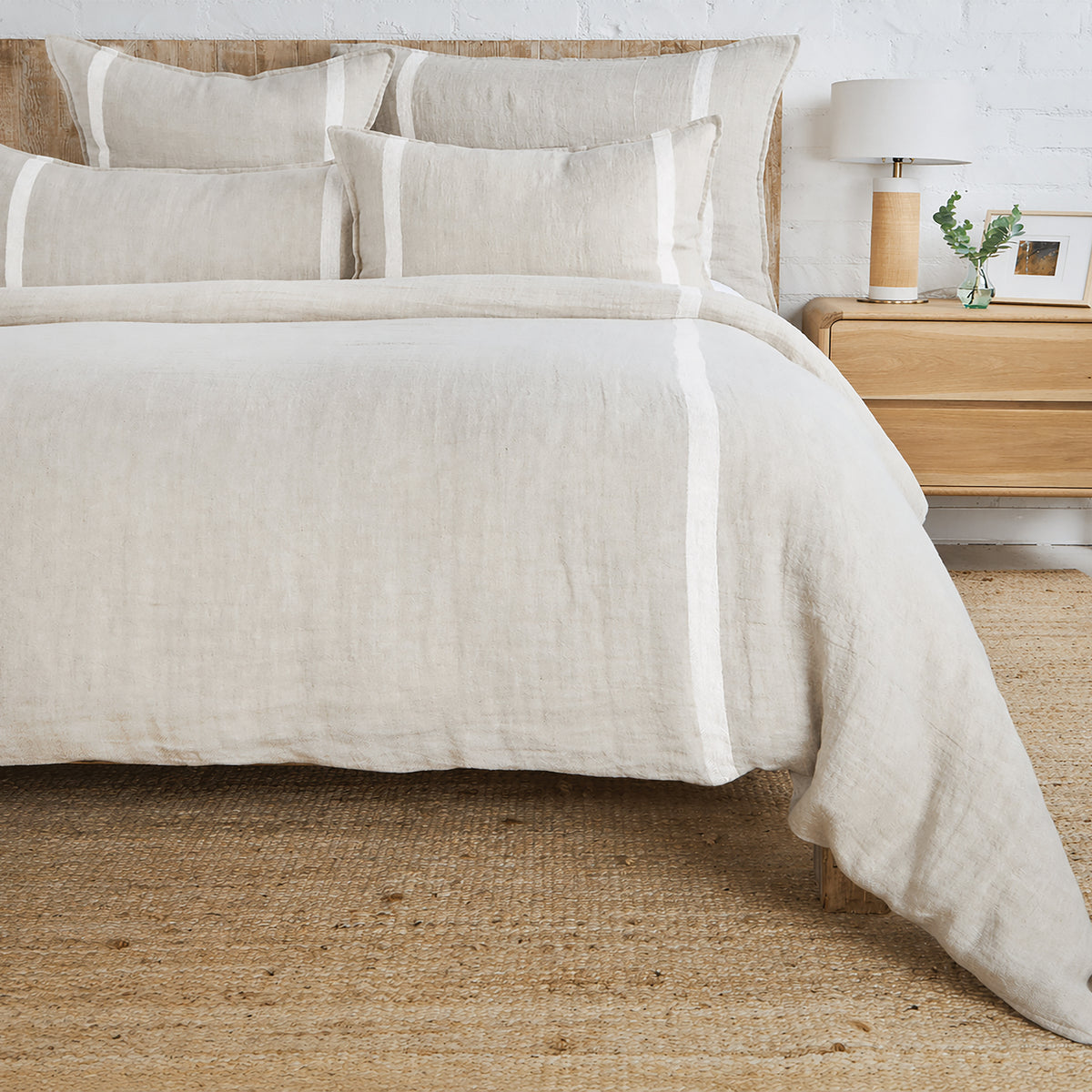 Linen duvet cover in off-white with large cream stripe panel