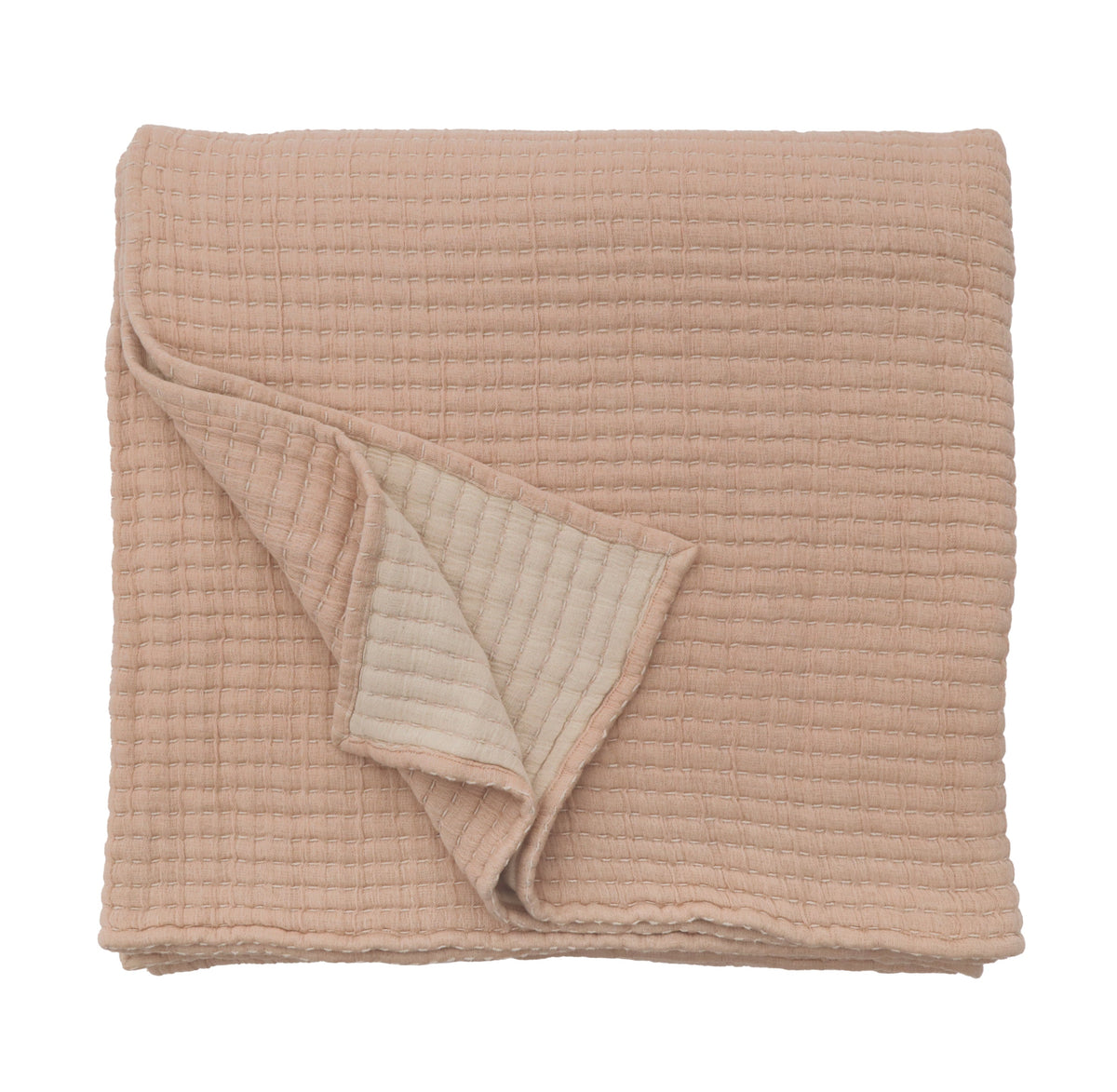 Vancouver coverlet folded in amber, quilted with looped stitch texture