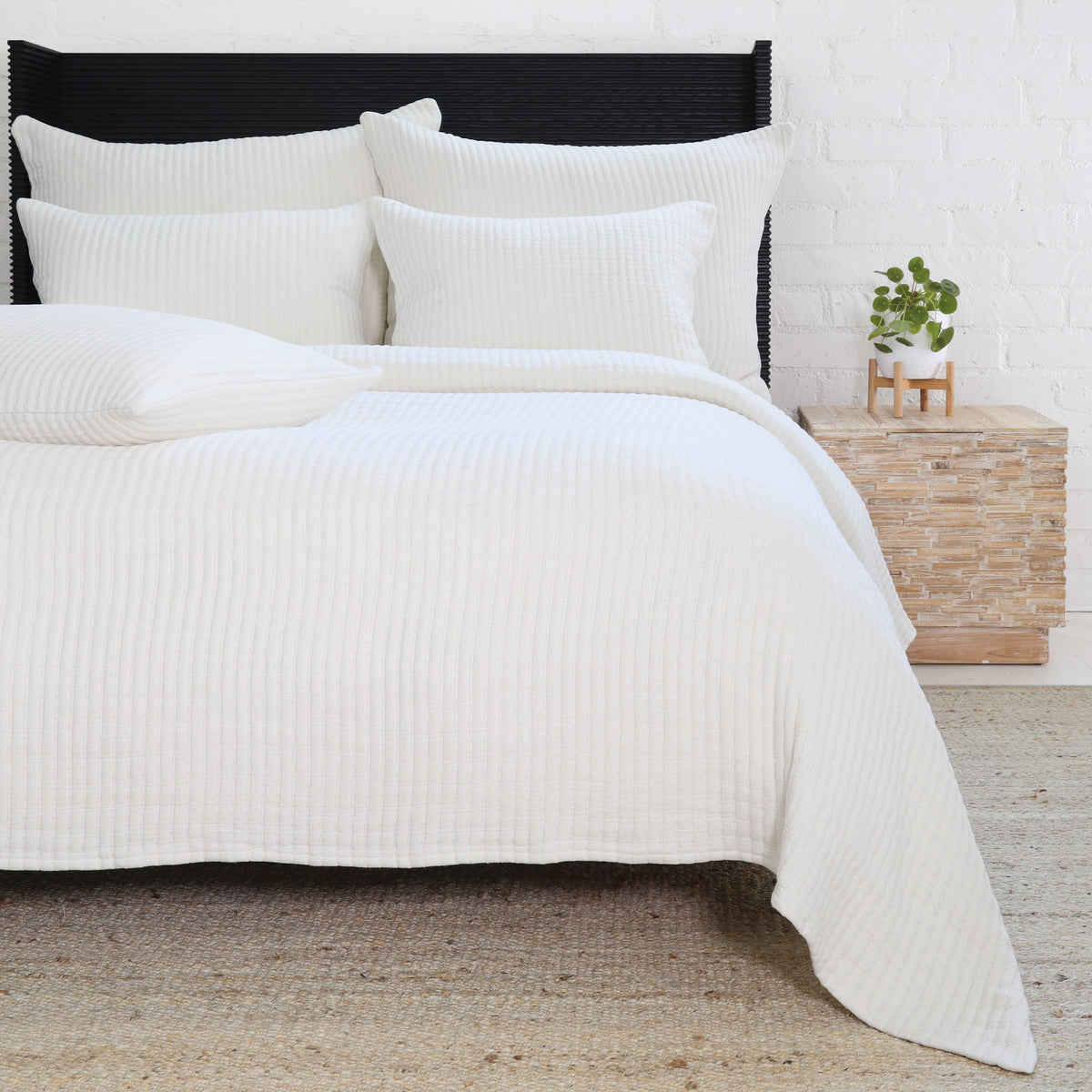 White textured coverlet set with matching pillows