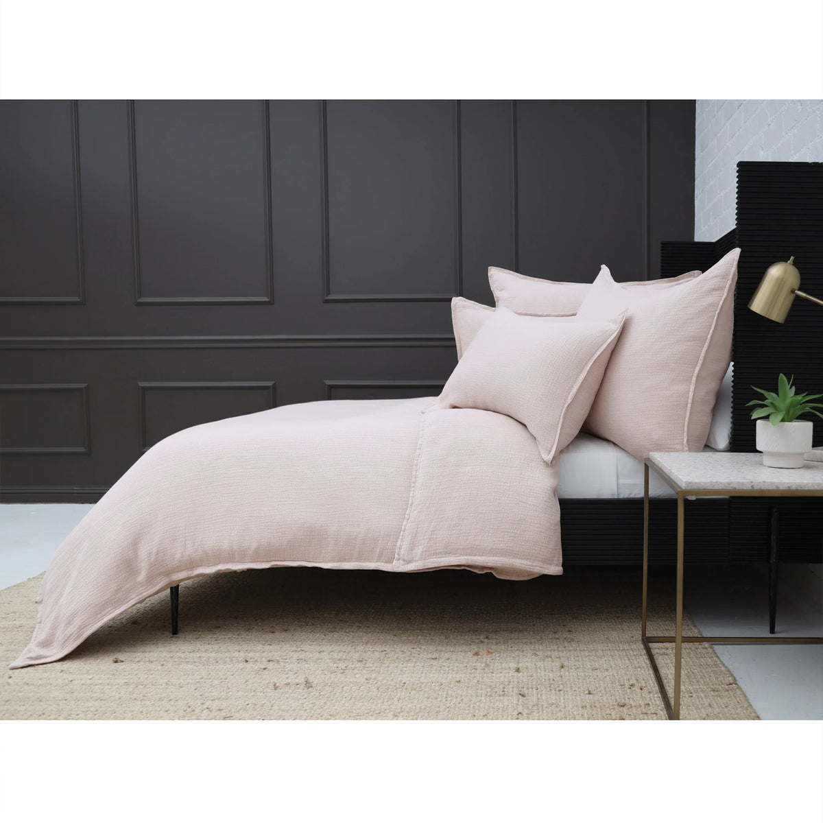 White cotton duvet cover set with matching shams and flat duvet